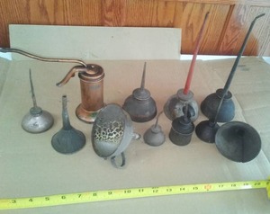 lot 13 image: Oil cans & funnels.