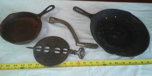 lot 19 image: Cast fry pans is Griswold damper