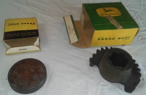 lot 30 image: Vintage John Deere parts & boxes.