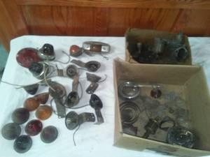 lot 56 image: Automotive glass & plastic lenses, taillights & more.