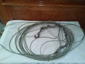 lot 79 image: Wrapped airline cable with chain and hook