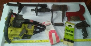 lot 91 image: John Deere chainsaw, chains & more.