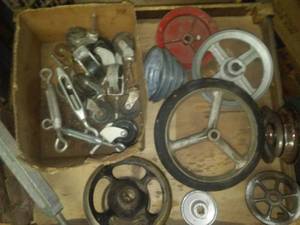 lot 93 image: Turnbuckles, pulley wheels & casters.