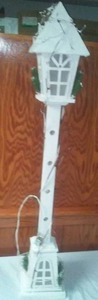 lot 167 image: Lighted decorative wood post decor.