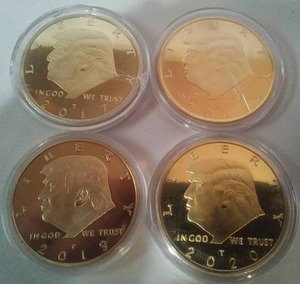 lot 64 image: Donald Trump Gold Coins 2017, 18, 19, 20. Full 4 year set.