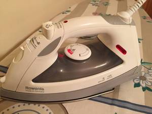 lot 105 image: Ironing Board And Rowenta Iron