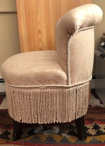 lot 138 image: Upholstered Ivory Chair with Decorative Fringe