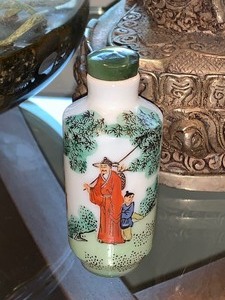 lot 70 image: Home Decor Items Faux Orchid Plant, Cast Metal Buddha and More