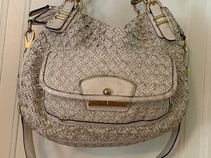 lot 304 image: White Coach Purse