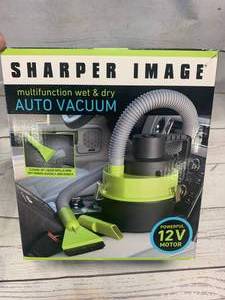 lot 7 image: Sharper Image Auto Vacuum (appears new)