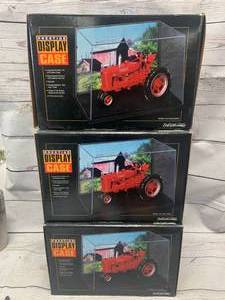 lot 10 image: Lot of 3 Ertl Prestige Display Cases