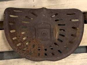 lot 101 image: Antique Tractor Seat