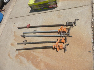 lot 21 image: 5 Adjustable Pipe Clamps