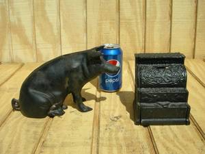 lot 15 image: Cast Iron Pig and Register Banks