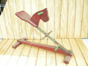 lot 34 image: Primitive Childs Ride-On Horse Toy