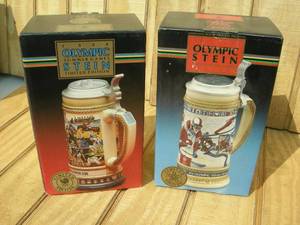 lot 126 image: 2 Vintage Anheuser Busch Olympic Steins