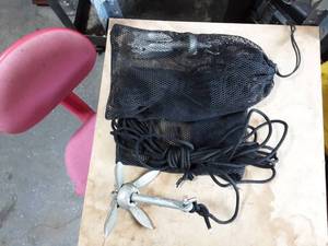 lot 40 image: 2-Small Kayak Anchors With Storage Bags
