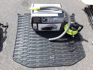 lot 65 image: BMW Car Cover, Jeep Floor Mat, 12 Volt Vac