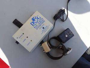 lot 77 image: Electronic Dog Guard Out Of Site Fencing