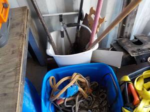 ropes, saws, cast iron bar, and mor...