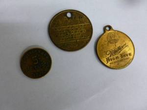 lot 155 image: Vintage Brass Tokens