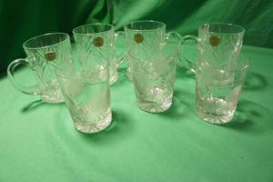 lot 41 image: Paul Sebastian 24% Lead Crystal Criss Cut Pattern Mugs- Set of 4 & Floral Etched Highball Glasses - Set of 3