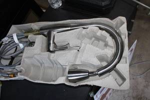lot 40 image: Fairbury Single-Handle Pull-Down Sprayer Kitchen Faucet in Stainless Steel