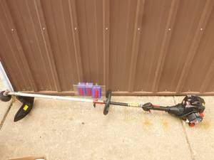 Craftsman 2 cycle weed trimmer. Used condition. Tested & works. As shown.