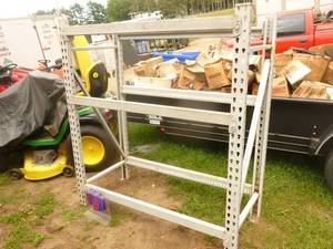 Steel shelfrack heavy duty. Approx 2 x 4 with 3 levels. As shown.