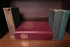 lot 41 image: Assorted webster dictionaries