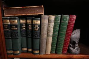 lot 53 image: Vintage Library edition of books with Iron ship book end