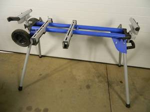 lot 24 image: Kobalt Mobile Folding Miter Saw Stand with Wheels