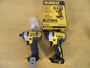 lot 50 image: 2 Dewalt 20 Volt Impacts (working but issues)