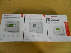 lot 59 image: 3 Honeywell Thermostats