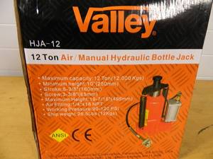 lot 145 image: New Air  Hydraulic 12 Ton Bottle Jack