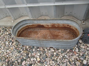 lot 216 image: Chain Link Fence & Water Tank
