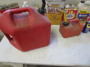 lot 64 image: Misc. Oils & Gas Jugs