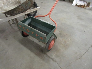 lot 77 image: Wheelbarrow & Grass Seeder