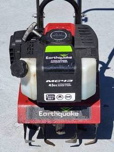 lot 15 image: Gas Powered Garden Tiller  2 Cycle Cultivator by Earthquake