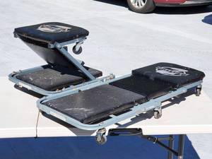 lot 26 image: Two Rolling Shop Stools that unfold to be Creepers