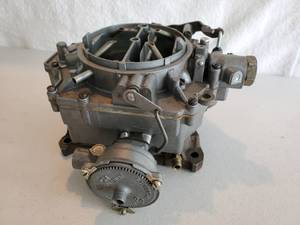 lot 76 image: Carburetor for a 1958 Chevy Impala