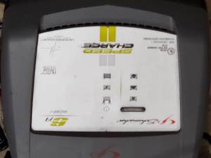 lot 216 image: (2) Electric Drills  Speed Charger  Dremel Tool