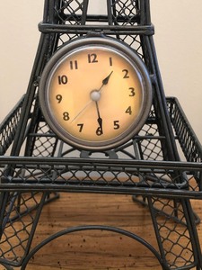 lot 104 image: Eiffel Tower Clock and Two Oil Lamps