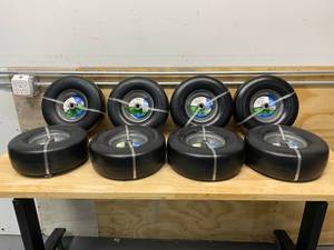 lot 28 image: ARNOLD Lot of Eight- 13 in. x 5 in. Universal Flat Free Zero Turn Front Wheel Assembly with Smooth Tread