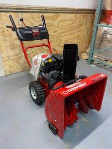 lot 91 image: TROY-BILT 24 in. 208 cc Two-Stage Gas Snow Blower with Electric Start Self Propelled