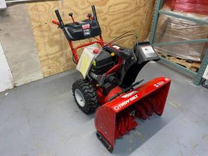 lot 92 image: TROY-BILT Storm 30 in. 357cc Two-Stage Electric Start Gas Snow Blower with Power Steering and Heated Grips