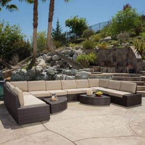 lot 304 image: Noble House Santa Cruz Dark Brown Wicker Outdoor Sectional Corner Piece with Beige Cushions and Table, 7194 - Corner Piece and 1 table only.