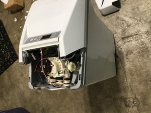 lot 2 image: GE 30,000 Grain Water Softener Has some damage and broken cover customer returns see pics