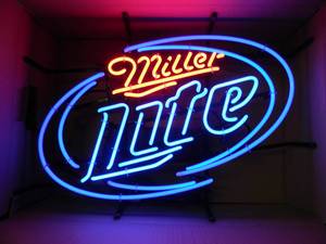 lot 4 image: NEW IN BOX ONLY OPENED FOR PICTURES - MILLER LITE NEON LIGHT - ANOTHER AWESOME PIECE FOR THE CAVE - APPROX 25 BY 18 - SEE PICTURES