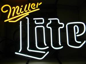 lot 41 image: NEW IN BOX ONLY OPENED FOR PICTURES - TWO COLOR MILLER LITE NEON LIGHT  - ANOTHER AWESOME PIECE FOR THE CAVE - APPROX 24 BY 17 - SEE PICTURES